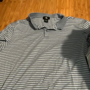 Calvin Klein, color, light blue-ish, dark blue buttoned up white, size extra lar